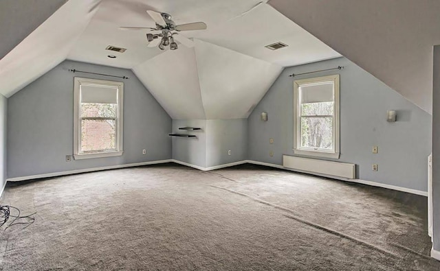 1964 Norfolk St, Houston, TX 77098 - bonus room featuring radiator, carpet, vaulted ceiling, a ceiling fan, and baseboards