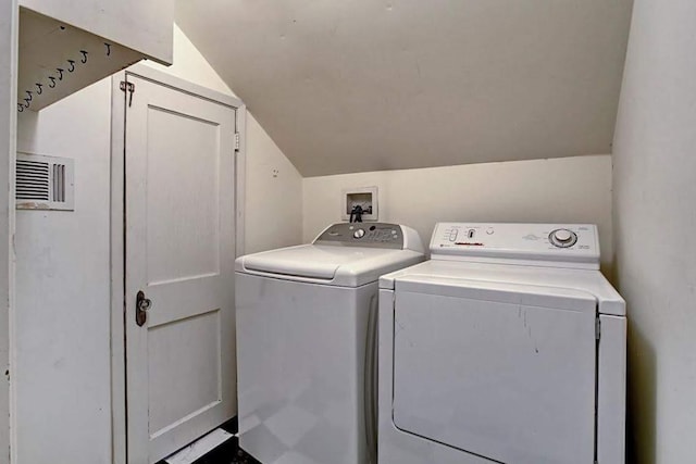 1964 Norfolk St, Houston, TX 77098 - laundry area with washer and dryer and cabinet space
