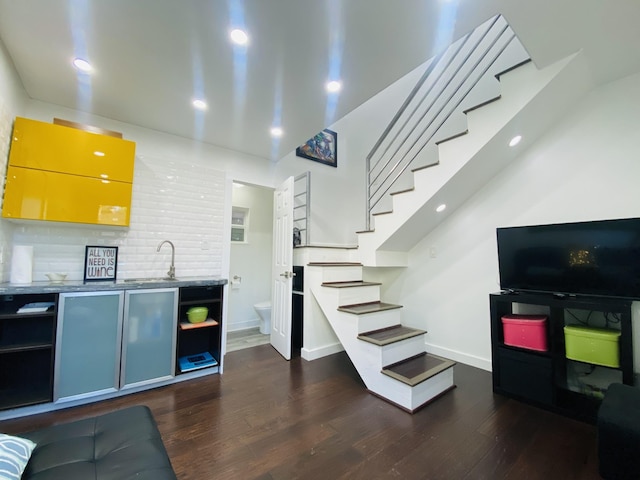 1964 Norfolk St, Houston, TX 77098 - living area featuring stairway, dark wood-style floors, baseboards, and recessed lighting