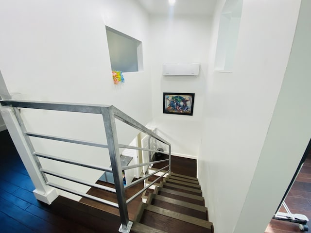 1964 Norfolk St, Houston, TX 77098 - stairway featuring wood finished floors