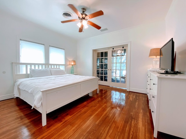 1964 Norfolk St, Houston, TX 77098 - bedroom with wood finished floors, baseboards, french doors, and a ceiling fan