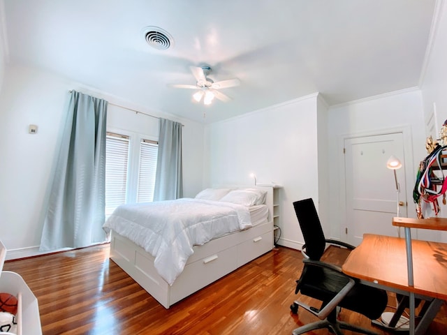 1964 Norfolk St, Houston, TX 77098 - bedroom featuring wood finished floors, ornamental molding, a desk, and baseboards