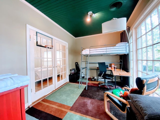 1964 Norfolk St, Houston, TX 77098 - bedroom featuring multiple windows, an office area, french doors, and crown molding