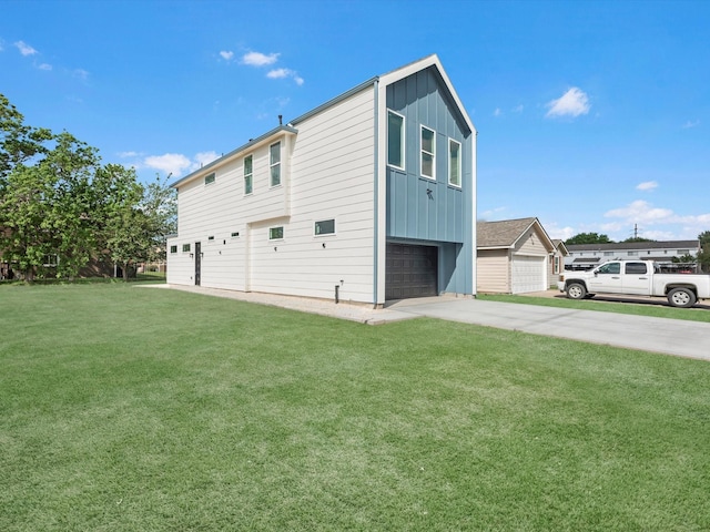 1130 Miller Rd, Sealy, TX 77474 - view of outbuilding with a garage and driveway