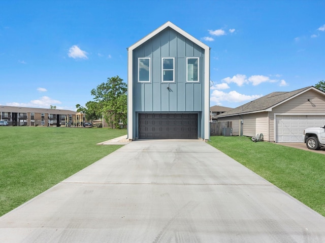 1130 Miller Rd, Sealy, TX 77474 - view of outdoor structure featuring central AC unit, an attached garage, and concrete driveway