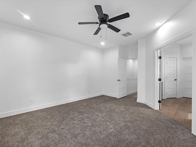 1130 Miller Rd, Sealy, TX 77474 - spare room featuring visible vents, baseboards, dark colored carpet, a ceiling fan, and recessed lighting