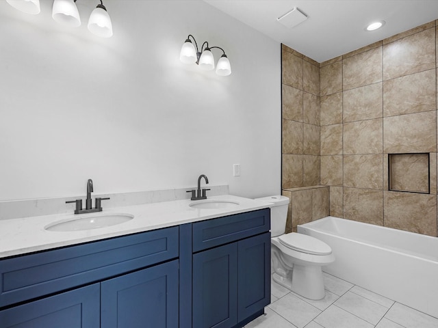 1130 Miller Rd, Sealy, TX 77474 - bathroom with a sink, toilet, double vanity, and tile patterned flooring