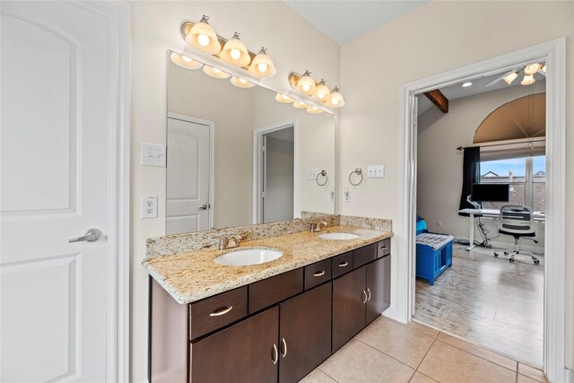 5329 Kansas St, Houston, TX 77007 - full bath with tile patterned floors, double vanity, and a sink