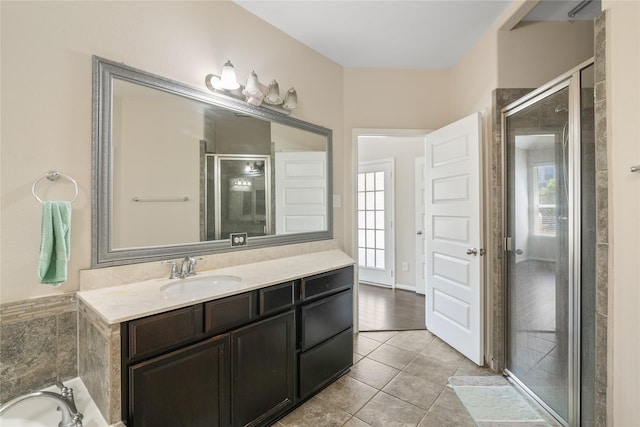 13315 Edison Trace Ln, Tomball, TX 77377 - full bath featuring a stall shower, vanity, a washtub, and tile patterned floors