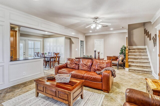 3026 Dees Cir, Sealy, TX 77474 - living area featuring a ceiling fan, stairs, visible vents, ornamental molding, and recessed lighting