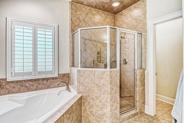 3026 Dees Cir, Sealy, TX 77474 - full bathroom with a garden tub, a shower stall, and tile patterned floors