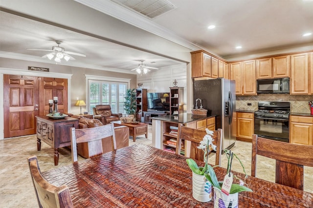 3026 Dees Cir, Sealy, TX 77474 - kitchen with crown molding, backsplash, black appliances, and a ceiling fan