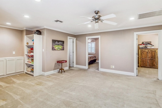 3026 Dees Cir, Sealy, TX 77474 - unfurnished room featuring a ceiling fan, crown molding, visible vents, and light colored carpet