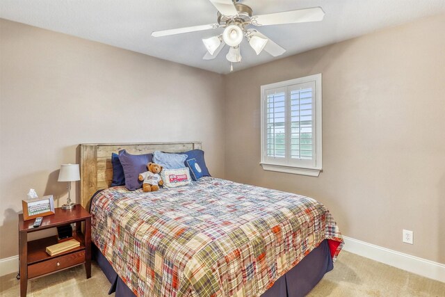 3026 Dees Cir, Sealy, TX 77474 - carpeted bedroom featuring baseboards and a ceiling fan