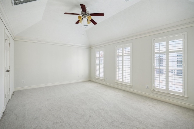 unfurnished room featuring ceiling fan, vaulted ceiling, carpet floors, and visible vents