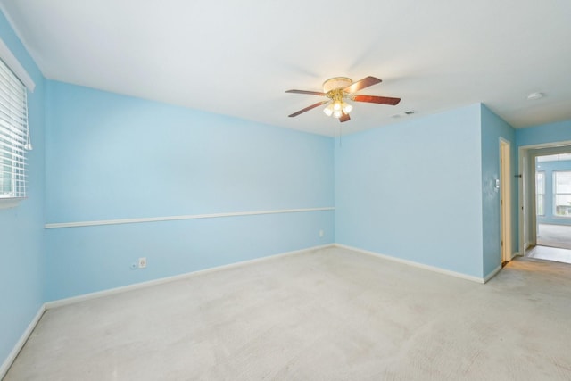 7463 Brompton St Unit 7463, Houston, TX 77025 - unfurnished room with a ceiling fan, baseboards, and carpet floors