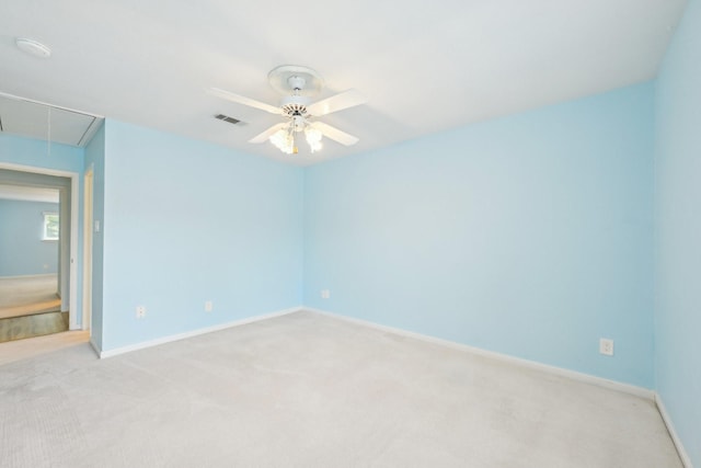 7463 Brompton St Unit 7463, Houston, TX 77025 - spare room featuring attic access, light carpet, and baseboards