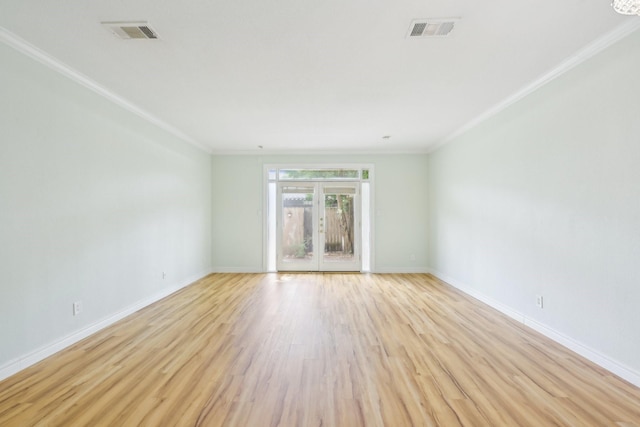 7463 Brompton St Unit 7463, Houston, TX 77025 - spare room with ornamental molding, light wood finished floors, and baseboards