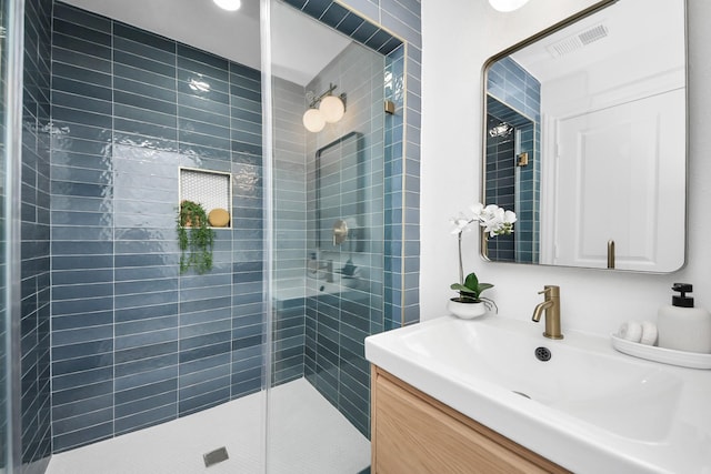 300 Narcissus Rd, Clear Lake Shores, TX 77565 - bathroom with a stall shower, vanity, and visible vents