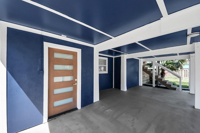 300 Narcissus Rd, Clear Lake Shores, TX 77565 - property entrance featuring a patio and stucco siding