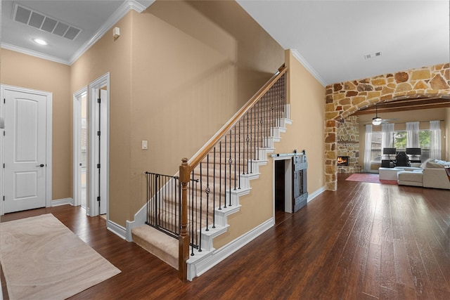 321 Westwood Dr, League City, TX 77573 - foyer entrance with ornamental molding, hardwood / wood-style floors, stairway, ceiling fan, and baseboards