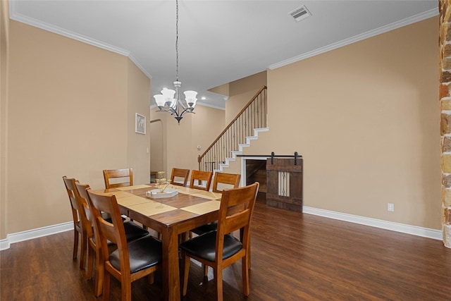321 Westwood Dr, League City, TX 77573 - dining room with wood finished floors, baseboards, a chandelier, crown molding, and stairway
