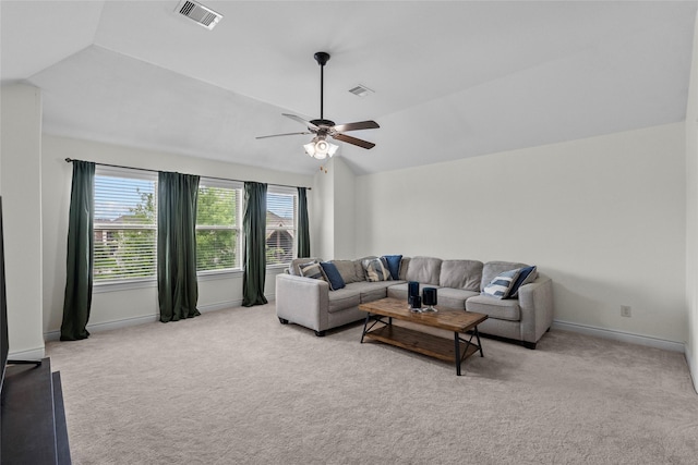 321 Westwood Dr, League City, TX 77573 - living room featuring light carpet, lofted ceiling, baseboards, and a ceiling fan