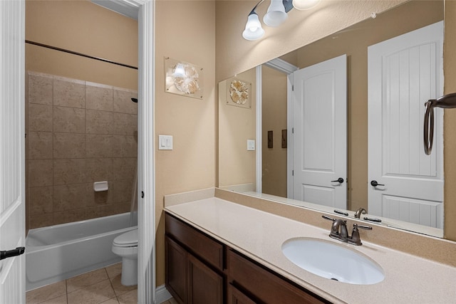 321 Westwood Dr, League City, TX 77573 - bathroom featuring toilet, tile patterned flooring, vanity, and bathtub / shower combination