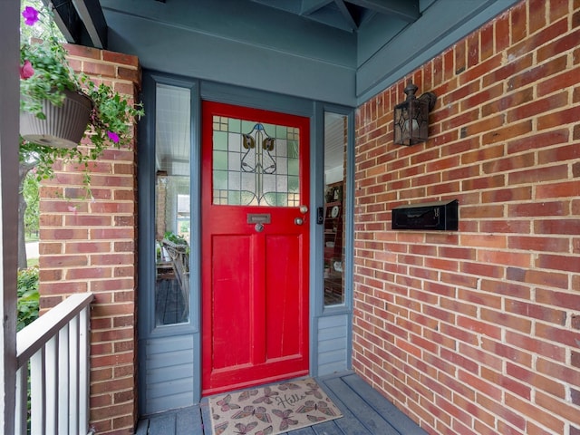 824 Sledge St, Houston, TX 77009 - doorway to property featuring brick siding