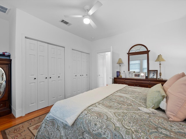 824 Sledge St, Houston, TX 77009 - bedroom with wood finished floors, multiple closets, and ceiling fan