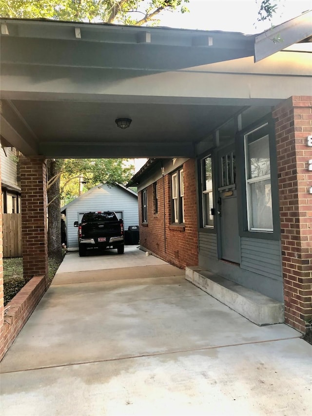 824 Sledge St, Houston, TX 77009 - view of vehicle parking with concrete driveway and an attached carport