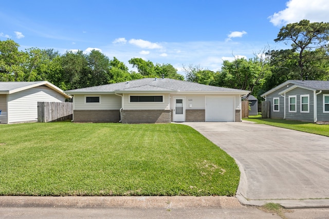 ranch-style house featuring concrete driveway, a front lawn, an attached garage, brick siding, and fence