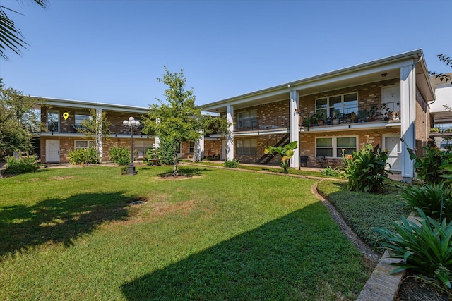 3535 Nasa Rd 1St Pkwy, Unit 36, Seabrook, TX 77586 - view of yard with a balcony