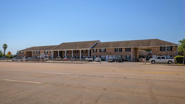 3535 Nasa Rd 1St Pkwy, Unit 36, Seabrook, TX 77586 - view of building exterior featuring uncovered parking