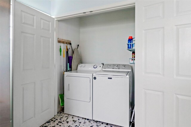 13213 Gulf Beach Dr, Freeport, TX 77541 - laundry area with laundry area and washing machine and clothes dryer