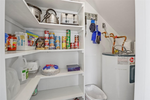 storage area featuring water heater