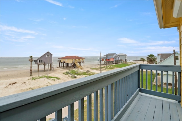deck featuring a water view