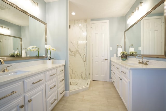 bathroom featuring visible vents, a marble finish shower, vanity, and recessed lighting