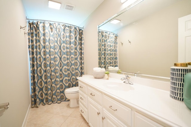 bathroom featuring visible vents, a shower with curtain, toilet, vanity, and tile patterned floors