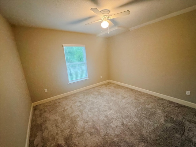 3060 Noble St, Houston, TX 77026 - carpeted spare room featuring baseboards and a ceiling fan