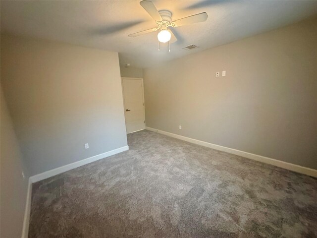 3060 Noble St, Houston, TX 77026 - carpeted empty room with visible vents, baseboards, and a ceiling fan