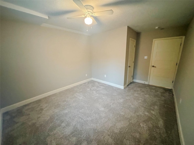 3060 Noble St, Houston, TX 77026 - carpeted empty room with baseboards and ceiling fan