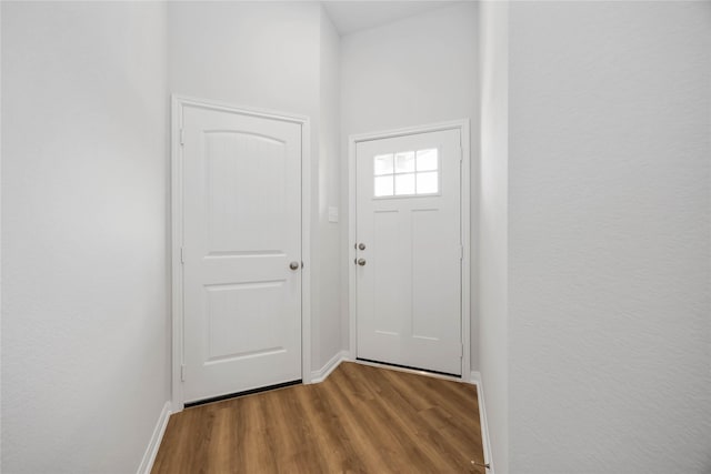 11752 Whirlaway Dr, Willis, TX 77318 - entryway with wood finished floors and baseboards