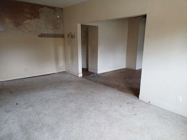 1302 S 23rd St, Temple, TX 76504 - carpeted empty room with baseboards