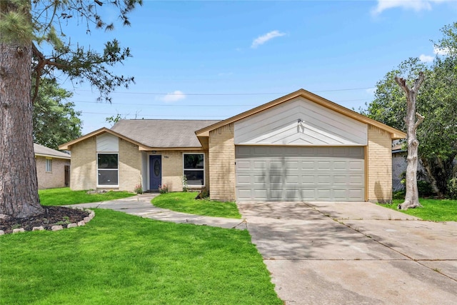 19314 Cypress Arbor Ct, Katy, TX 77449 - view of front of house with brick siding, driveway, a front yard, and a garage