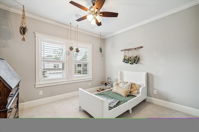 1411 Overhill St, Houston, TX 77018 - bedroom featuring baseboards, ornamental molding, a ceiling fan, and carpet floors