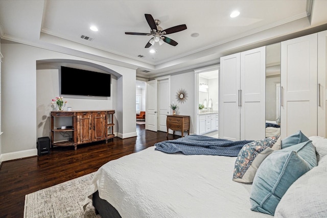 1411 Overhill St, Houston, TX 77018 - bedroom with crown molding, wood finished floors, visible vents, and a raised ceiling