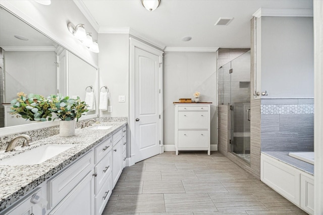 1411 Overhill St, Houston, TX 77018 - bathroom with visible vents, a sink, a shower stall, and crown molding
