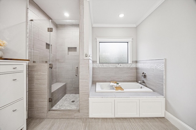 1411 Overhill St, Houston, TX 77018 - bathroom featuring recessed lighting, a garden tub, a stall shower, and ornamental molding
