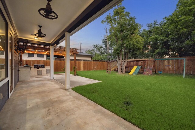 1411 Overhill St, Houston, TX 77018 - view of yard featuring area for grilling, a patio, a fenced backyard, and a playground